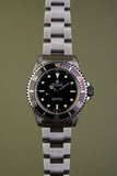 1997 Rolex 14060 Submariner with Tropical bezel