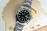2004 Rolex “kermit”  16610lv Anniversary Submariner - Box and Papers -