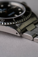 1997 Rolex 14060 Submariner with Tropical bezel