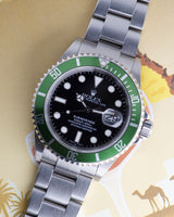 2004 Rolex “kermit”  16610lv Anniversary Submariner - Box and Papers -