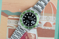 2004 Rolex “kermit”  16610lv Anniversary Submariner - Box and Papers -