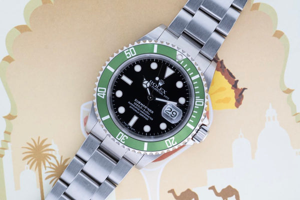 2004 Rolex “kermit”  16610lv Anniversary Submariner - Box and Papers -