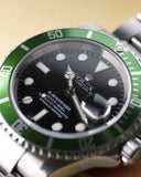 2004 Rolex “kermit”  16610lv Anniversary Submariner - Box and Papers -