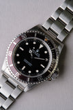 1997 Rolex 14060 Submariner with Tropical bezel