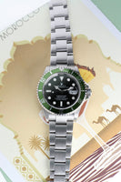 2004 Rolex “kermit”  16610lv Anniversary Submariner - Box and Papers -