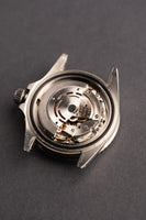 1986 Rolex 168000 “triple 0” Submariner