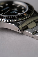 1997 Rolex 14060 Submariner with Tropical bezel
