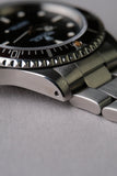 1997 Rolex 14060 Submariner with Tropical bezel