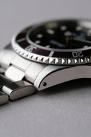 1997 Rolex 14060 Submariner with Tropical bezel