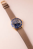 1987 Rolex gold 16808 Submariner w/ turning Purple dial