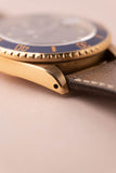 1987 Rolex gold 16808 Submariner w/ turning Purple dial