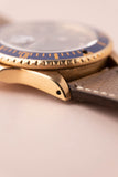 1987 Rolex gold 16808 Submariner w/ turning Purple dial