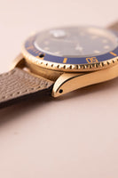 1987 Rolex gold 16808 Submariner w/ turning Purple dial