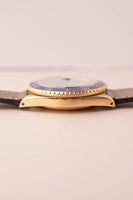 1987 Rolex gold 16808 Submariner w/ turning Purple dial