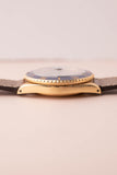 1987 Rolex gold 16808 Submariner w/ turning Purple dial