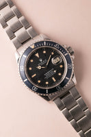 1985 Rolex 16800 Submariner turning tropical w/  blue insert