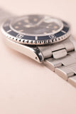 1985 Rolex 16800 Submariner turning tropical w/  blue insert