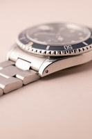1985 Rolex 16800 Submariner turning tropical w/  blue insert