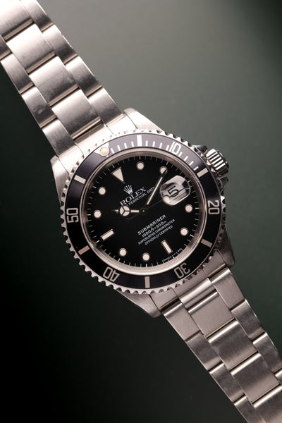 1997 Rolex 16610 Submariner w/ Papers