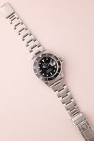 1997 Rolex 16610 Submariner w/ Papers