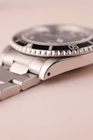 1997 Rolex 16610 Submariner w/ Papers