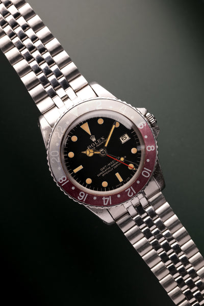 1965 Rolex 1675 Gilt Dial GMT “Boysenberry” Insert