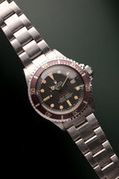 1973 Rolex 1680 Red Submariner Lavender Insert