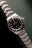 1997 Rolex 14060 Submariner With Papers