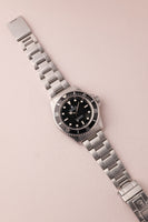 1997 Rolex 14060 Submariner With Papers