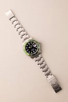 2003 Rolex 16610 T “Flat 4” Kermit Submariner