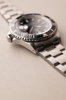 2001 Rolex 16610 Submariner - Full Set