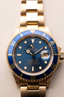 1991 Rolex Blue Pastel 16618 Yellow Gold Submariner - box and manuals