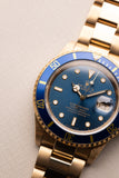 1991 Rolex Blue Pastel 16618 Yellow Gold Submariner - box and manuals