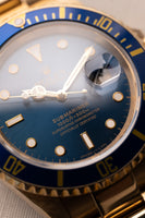 1991 Rolex Blue Pastel 16618 Yellow Gold Submariner - box and manuals