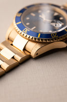 1991 Rolex Blue Pastel 16618 Yellow Gold Submariner - box and manuals