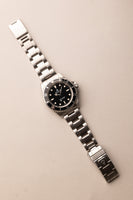 1997 Rolex 14060 Submariner - Box & Paper