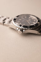 1997 Rolex 14060 Submariner - Box & Paper