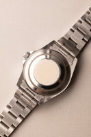 1997 Rolex 14060 Submariner - Box & Paper
