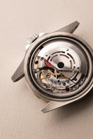 1997 Rolex 14060 Submariner - Box & Paper