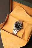 1997 Rolex 14060 Submariner - Box & Paper