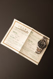 1997 Rolex 14060 Submariner - Box & Paper