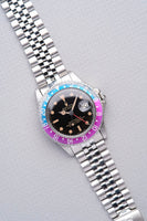 1965 Rolex Gilt 1675 GMT with Fuchsia turning Tropical