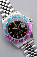 1965 Rolex Gilt 1675 GMT with Fuchsia turning Tropical