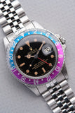 1965 Rolex Gilt 1675 GMT with Fuchsia turning Tropical