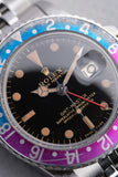 1965 Rolex Gilt 1675 GMT with Fuchsia turning Tropical