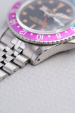 1965 Rolex Gilt 1675 GMT with Fuchsia turning Tropical