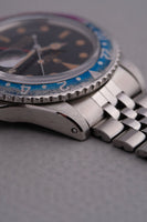 1965 Rolex Gilt 1675 GMT with Fuchsia turning Tropical