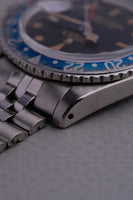1965 Rolex Gilt 1675 GMT with Fuchsia turning Tropical