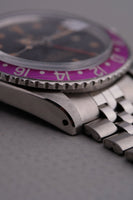 1965 Rolex Gilt 1675 GMT with Fuchsia turning Tropical