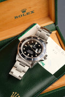 1996 Rolex 16610 - Box and Papers Blue insert